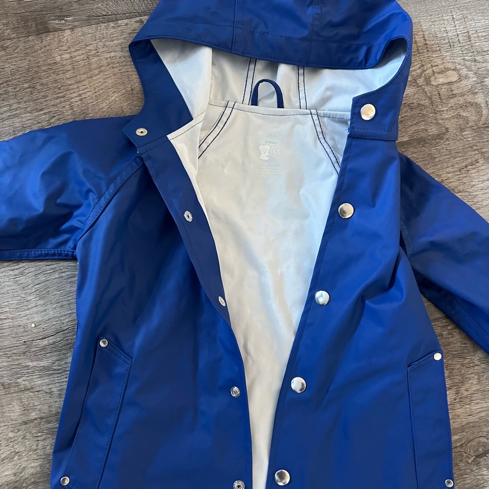 Boy’s Primary rain jacket. Barely worn. Blue.